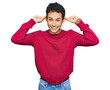 © Krakenimages.com - Young handsome man wearing casual clothes smiling pulling ears with fingers, funny gesture. audition problem