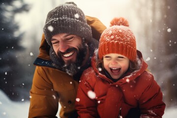 Wall Mural - Father and daughter are having fun in the snow, laughing and enjoying the winter wonderland