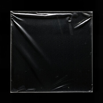 Transparent Square Plastic for Album Cover on Black Background 04