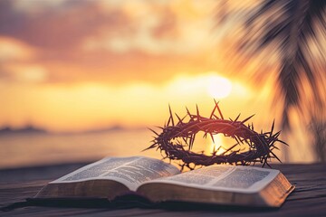 Wall Mural - Christian Cross and open book with a crown of thorns with a sunset scene background. Palm Sunday Concept 