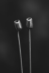 Poster - Minimalist Black and Silver Modern Design Metallic Sculpture with Dark Background