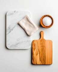Poster - Overhead view of a minimalist marble countertop featuring a wooden board and delicate cloth napkin creating a serene and balanced composition for a kitchen or dining scene
