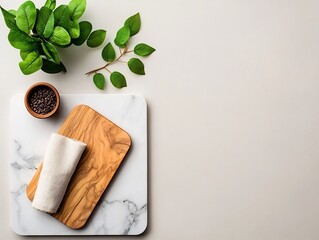 Poster - Overhead view of a minimalist tabletop arrangement featuring a marble surface a natural wood cutting board a soft fabric napkin and vibrant green foliage