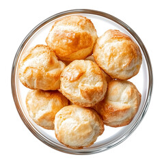 Poster - Golden profiteroles in glass bowl, isolated on transparency background, showcasing their crisp texture and appetizing appearance. Perfect for dessert or snack lovers