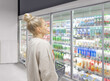 © lado2016 - supermarket shopping,Woman choosing a dairy products at supermarket