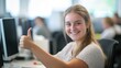 © Ketanoff - A young woman sits at her desk in a vibrant office, smiling brightly and giving a thumbs up. She radiates positivity amid a bustling backdrop, showcasing teamwork and enthusiasm