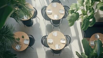 Poster - A bustling cafe layout with neatly arranged tables and chairs in a contemporary design, from above.