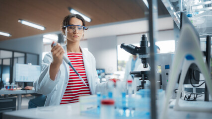 Aufkleber - Pharmaceutical Laboratory: Young Female Scientist Working with Samples, Using Micro Pipette for Mixing Chemicals and Acids. Advanced Scientific Specialist Working with Modern Digital Microscope