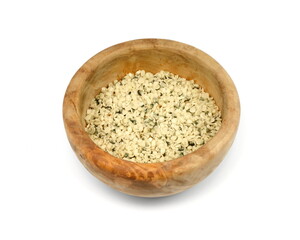 Wall Mural - Shelled Hemp Seed in a wooden bowl isolated on white. Hemp hearts isolated - Healthy Nutrition