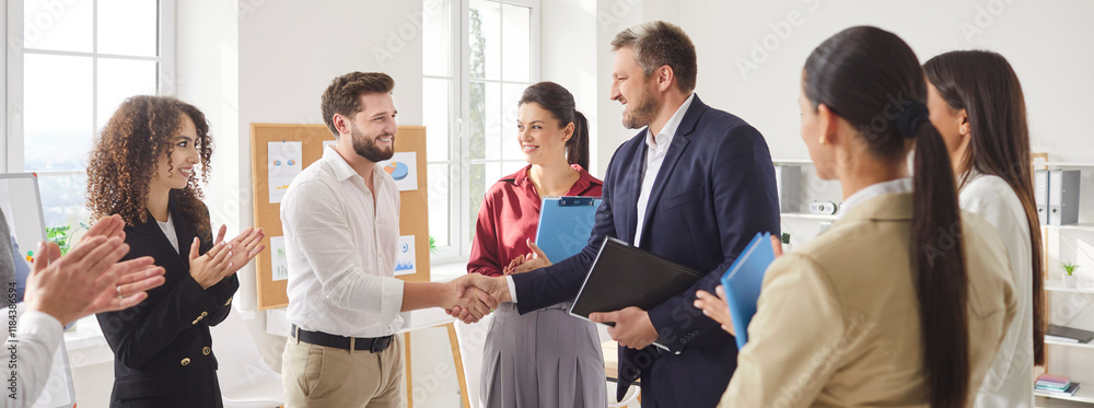 Getting Applause Happy proud male boss handshakes encouraging and thanking office ...