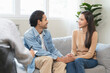 © Pormezz - Psychology, depression asian young couple, patient consulting problem mental health with psychologist, psychiatrist at clinic together, husband encouraging by holding hand of wife, therapy health care