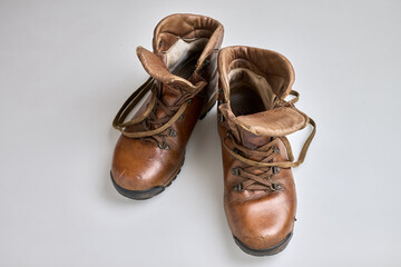 Vintage Brown  leather trekking shoes isolated on white