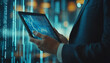 © c_ART_oons - businessman holding tablet with chart and financial data