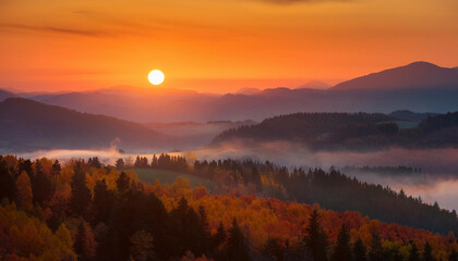 Wall Mural - orange sunrise over the hazy autumn mountains