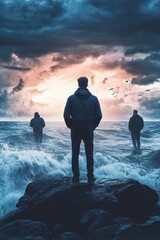 Poster - Three figures stand ocean rocks, stormy sea.