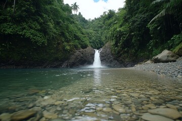 Aufkleber - Water flows gracefully down a rocky cliff into a transparent mountain stream, surrounded by vibrant foliage and rugged terrain, creating a serene atmosphere