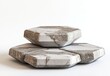 © Alexej - A modern product presentation setup featuring a white granite podium, a gray stone background, and an abstract pedestal in a studio, emphasizing a minimalist aesthetic