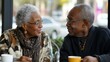 © Halina - Elderly couple enjoying a heartfelt conversation over coffee in a cozy cafe setting