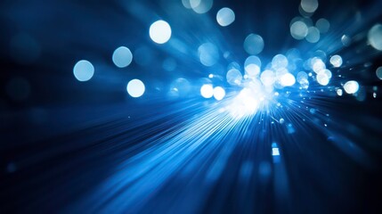 Poster - Abstract blue light burst with bokeh effect, radiating from center.