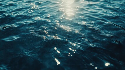 Poster - Glittering blue water surface reflecting sunlight in calming shades of blue.