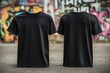 © Aleksander - A plain black t-shirt mockup from the front and back against a colorful graffiti background.