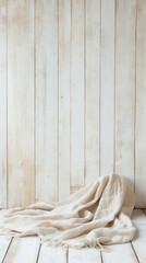 Fototapete - Soft beige fabric draped on rustic wooden floor, creating cozy atmosphere