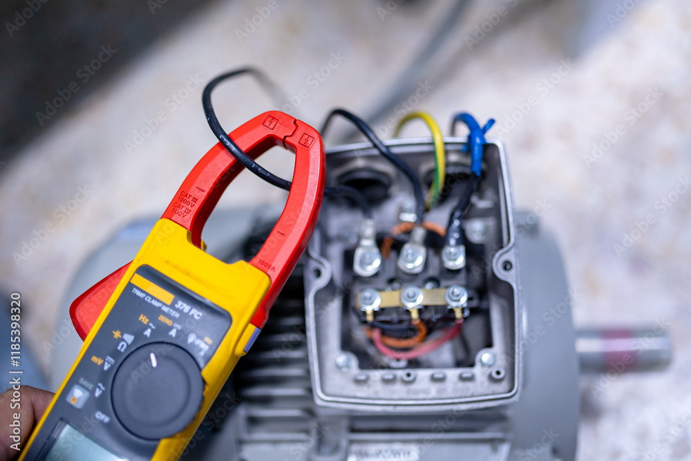 Electrical engineering uses a multimeter to measure the electrical ...