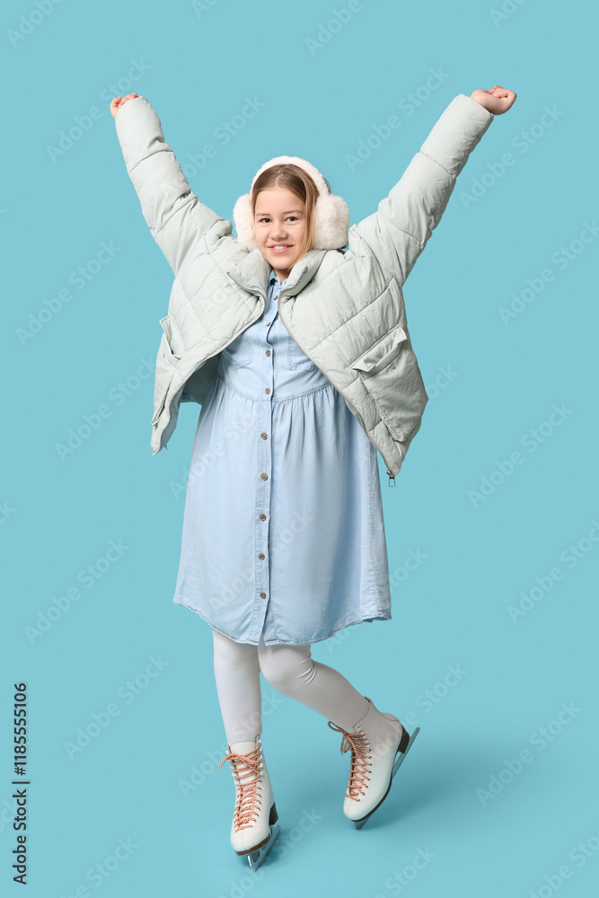 Happy girl in ice skates on blue background
