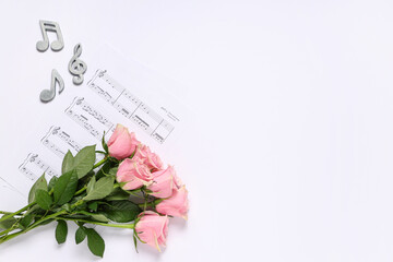 Wall Mural - Note sheet with roses on white background. Valentine's Day celebration