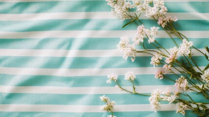 Aufkleber - Close up of delicate flowers resting on a vibrant turquoise and white striped background for fresh and modern aesthetic compositions