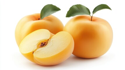 Sticker - Two ripe yellow plums with one cut in half showing its juicy flesh and seed on white background