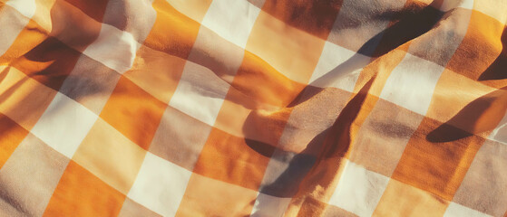 Poster - Gingham pattern fabric with a checkered design in warm orange tones