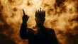 © Berkah - Silhouetted King Wearing Crown Raises Hand in Smoke