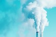 © Dina - Thick, dense smoke rises from tall industrial smokestacks, contrasting against a pale blue sky. The image underscores themes of environmental impact.