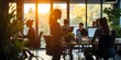 © Natsumae - Golden Hour Office: Silhouetted figures work amidst the warm glow of a setting sun, creating a serene and productive atmosphere.  The scene captures a moment of calm focus.