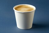 hot americano coffee in a white paper cup, side view ,black background