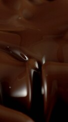 Poster - Super Slow Motion of Splashing and Mixing Hot Melted Chocolate, Creating Waves Shapes, Filmed on High Speed Cinema Camera, 1000 fps. Vertical Aspect Ratio.
