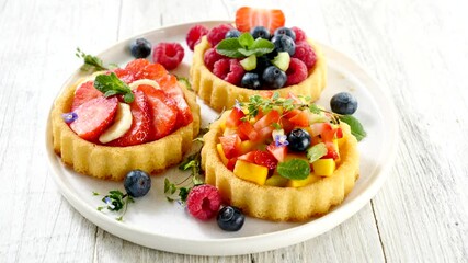 Wall Mural -  Fruit Tartlets with fresh berries 