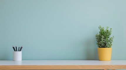 Poster - Minimalist desk with pencils and plant creating a productive environment