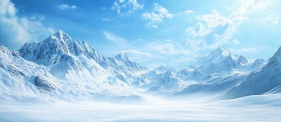 Wall Mural - Snowy mountains and snow covered fields against a blue sky. with copy space image. Place for adding text or design