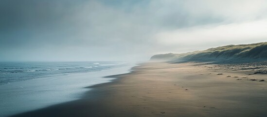 Wall Mural - Misty shoreline view at a beach. with copy space image. Place for adding text or design