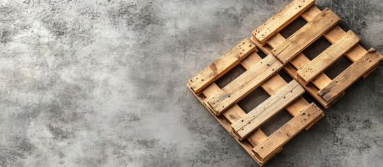 Leinwandbilder - Wooden pallets on a light grey table top view Room for text. with copy space image. Place for adding text or design