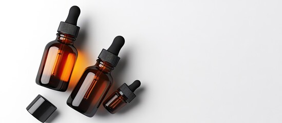 Poster - Dark glass texture bottles on a white background A cosmetic item containing essential oils and hyaluronic acid A beauty product designed for moisturizing and nourishing the skin Copyspace frame