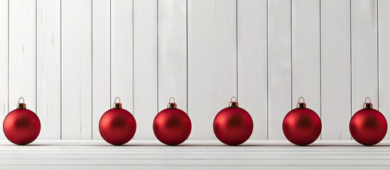 Poster - Arrangement of red Christmas baubles on white wooden boards. with copy space image. Place for adding text or design