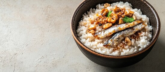 Fototapete - Japanese cuisine features simmered small sardines and walnuts served on rice. with copy space image. Place for adding text or design