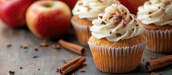 Fototapete - Apples and cinnamon components for cupcakes featuring copy space