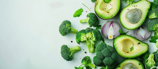 Aufkleber - Composition featuring cut out broccoli light onions and avocado halves Healthy vegan food lifestyle concept Image editing Food backdrop Copy space