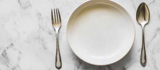 Aufkleber - Image of an empty white plate with a spoon and fork set against a white marble background Selective focus with a blurred background. with copy space image. Place for adding text or design