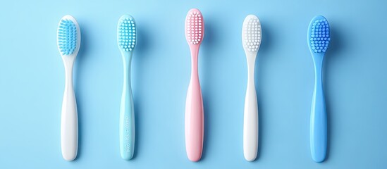 Aufkleber - Oral care Toothbrushes on a blue backdrop The idea of bathroom cosmetic products Flat lay top view copyspace Set of oral care products Dental hygiene