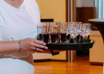 Tincture in glasses on a tray. High quality photo